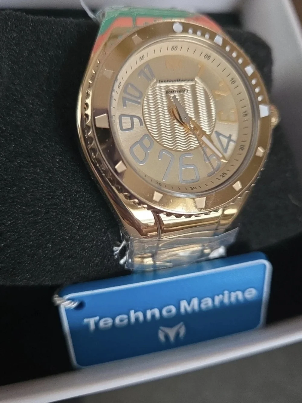 TM226010 TechnoMarine Invicta Gold Tone Unisex Watch with Wave Dial 38mm